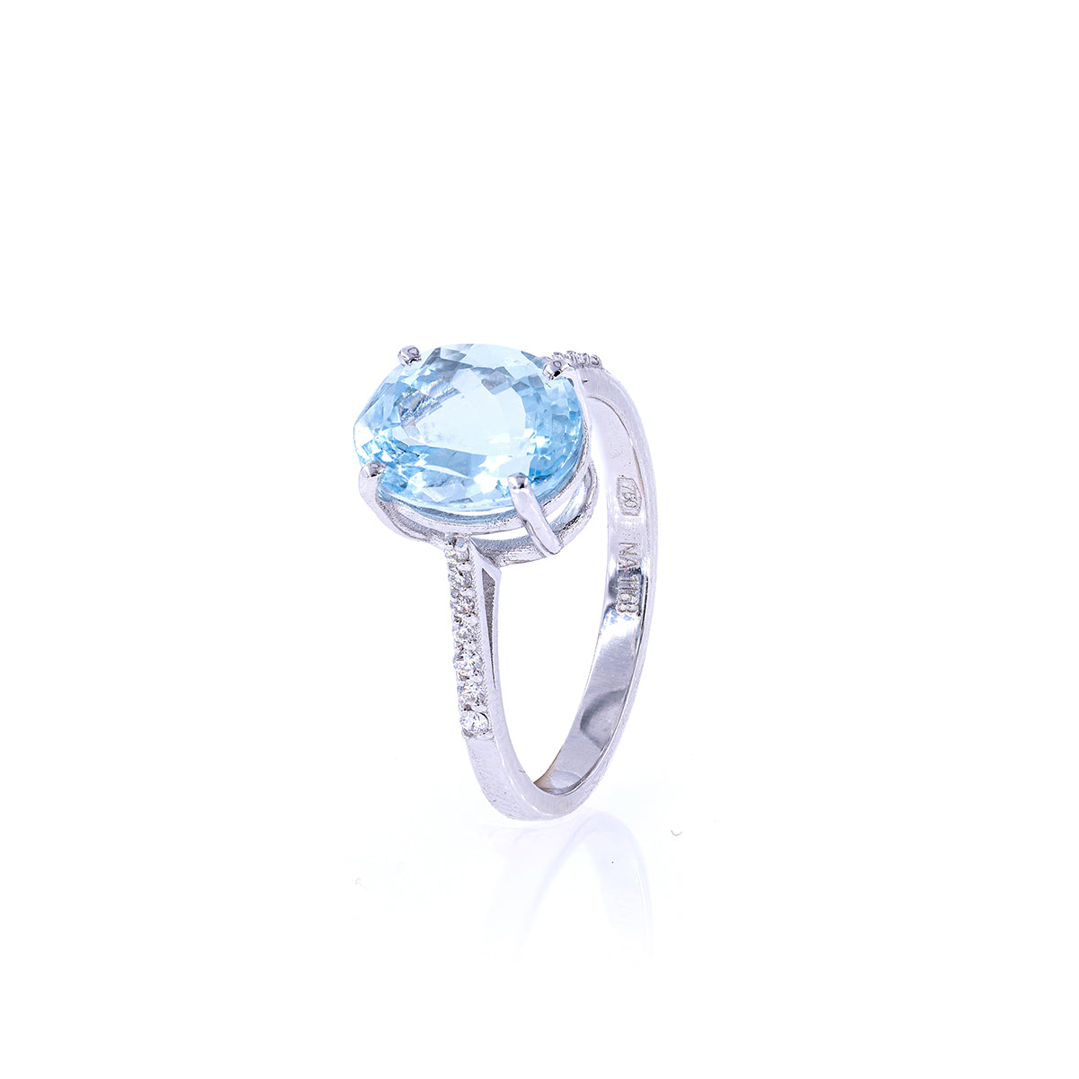 Gold ring 24 with aquamarine.