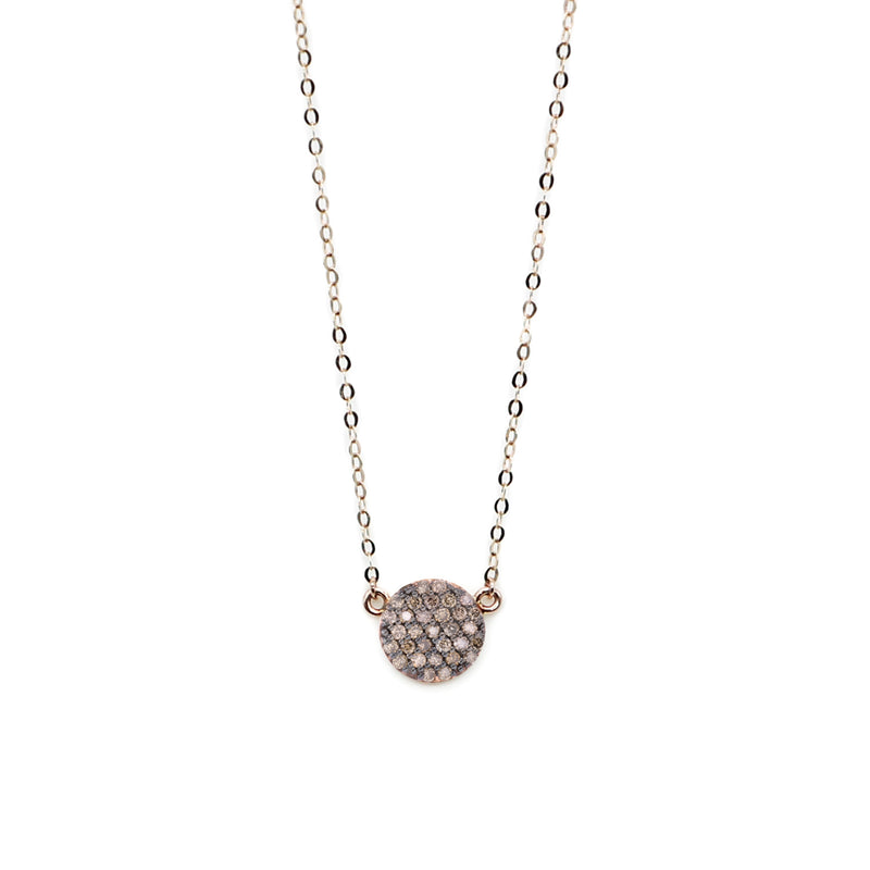 Rose gold necklace with diamonds.