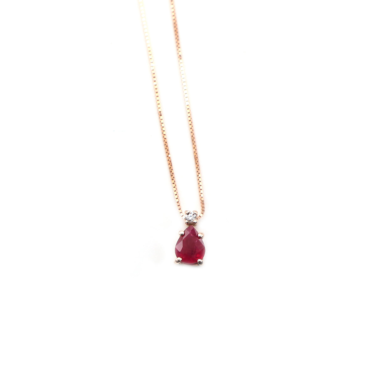 306 gold necklace with ruby.