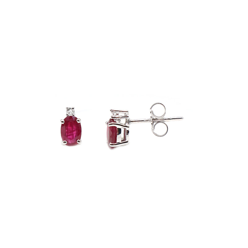 306 gold earrings with ruby.